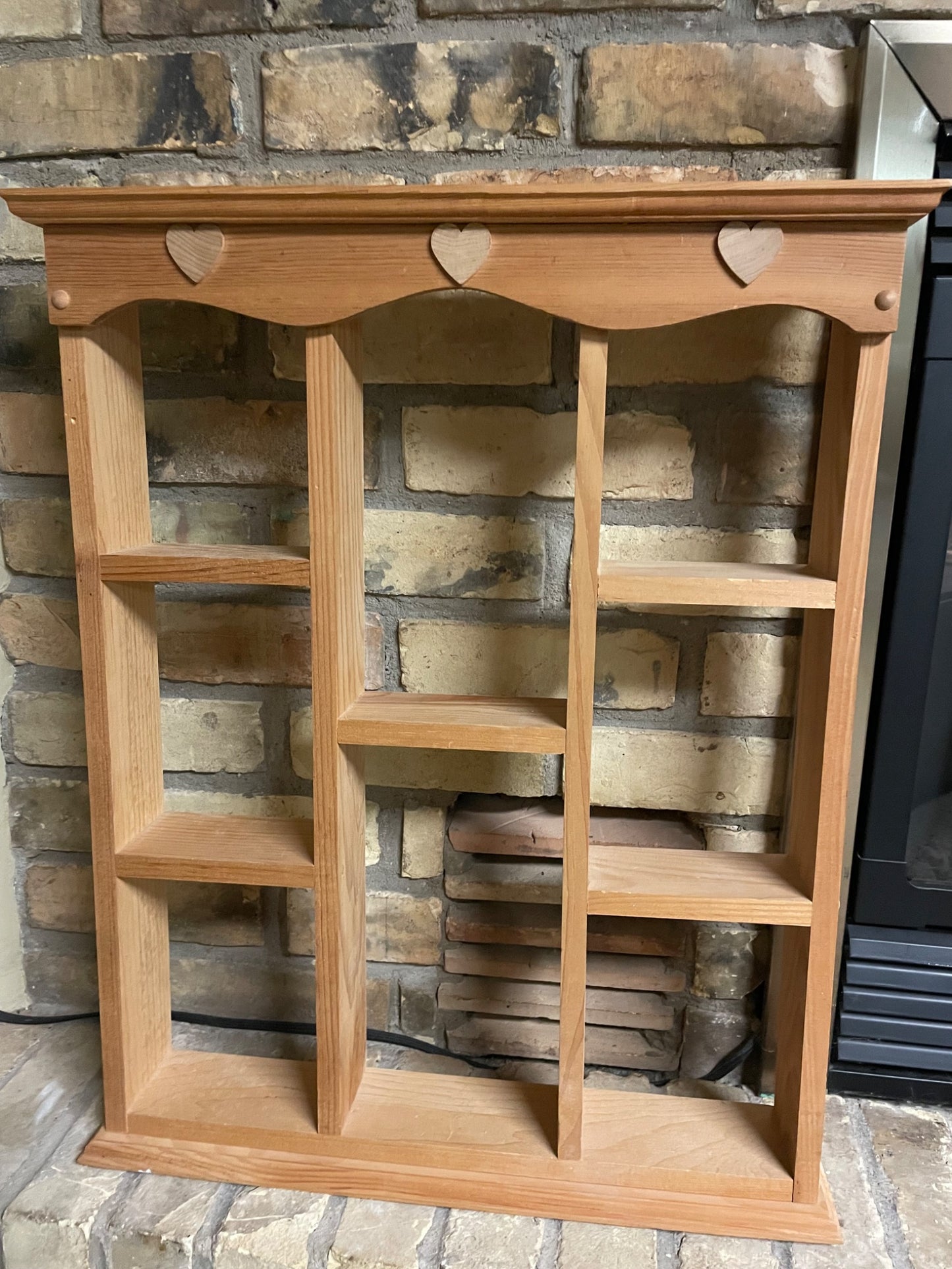 wooden trinket shelf with hearts