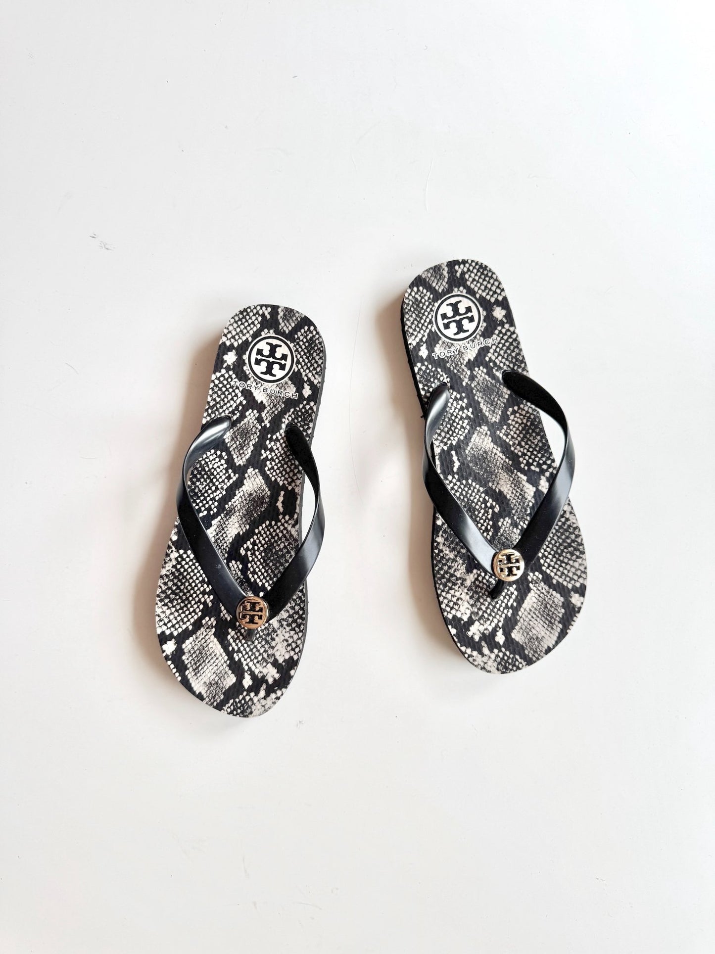 665f5e7d04f32b049949ecdf_tory-burch-thong-1-copy_1781106360096.jpg