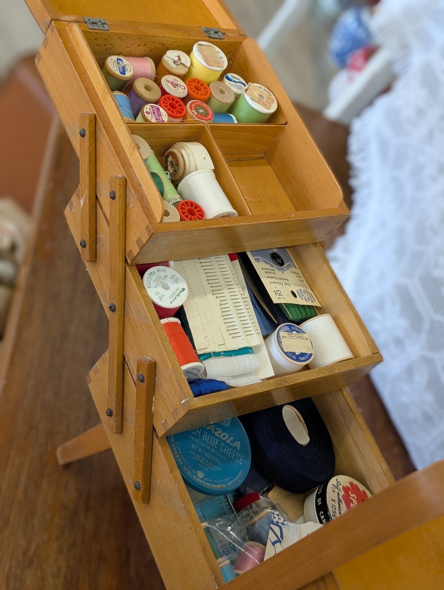 Wooden sewing box with contents