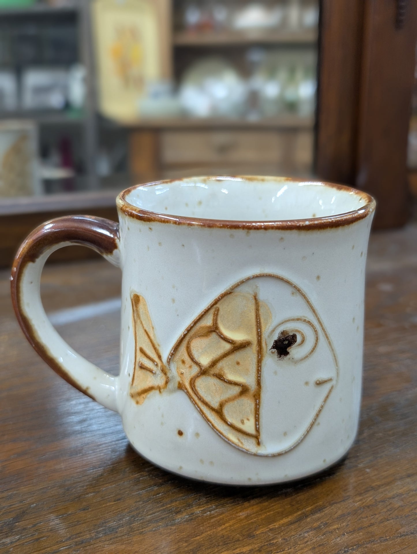 Retro mug with creature