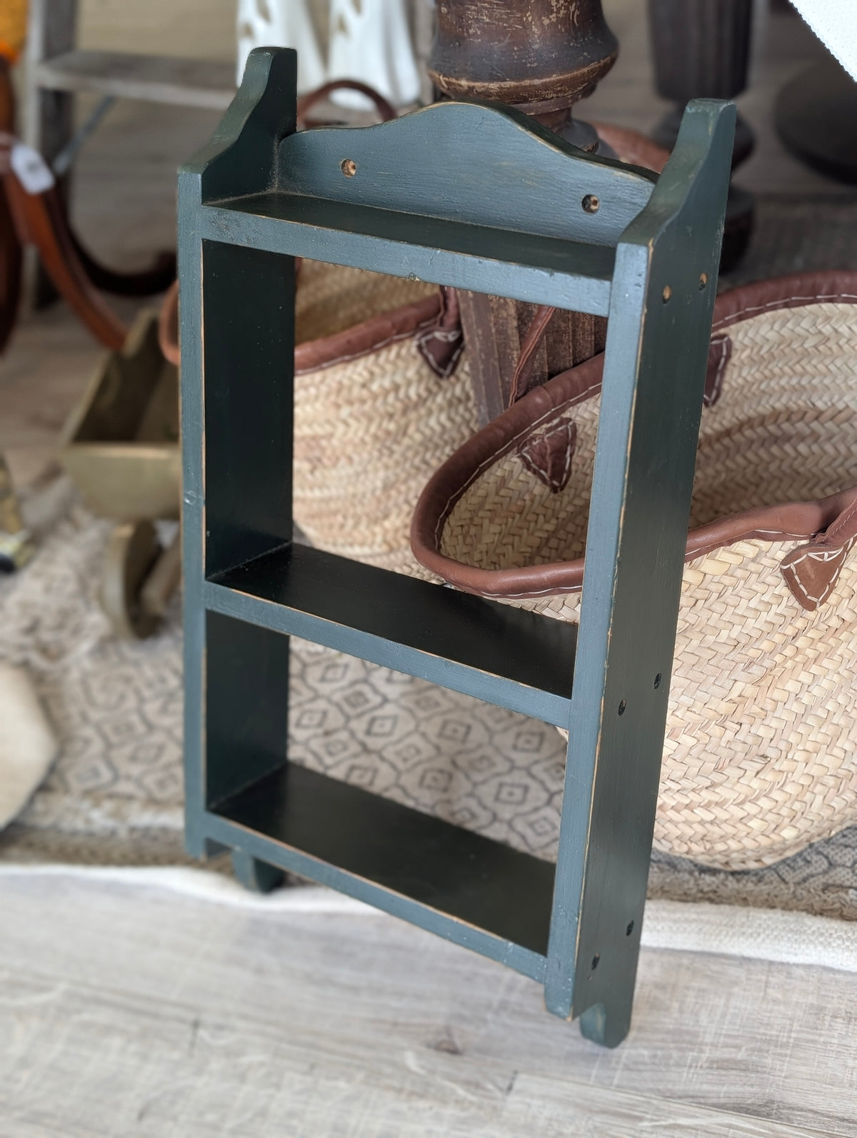 Green distressed wall shelf