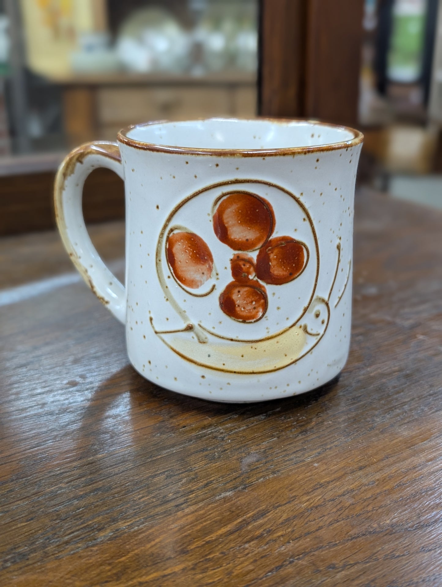 Retro mug with creature