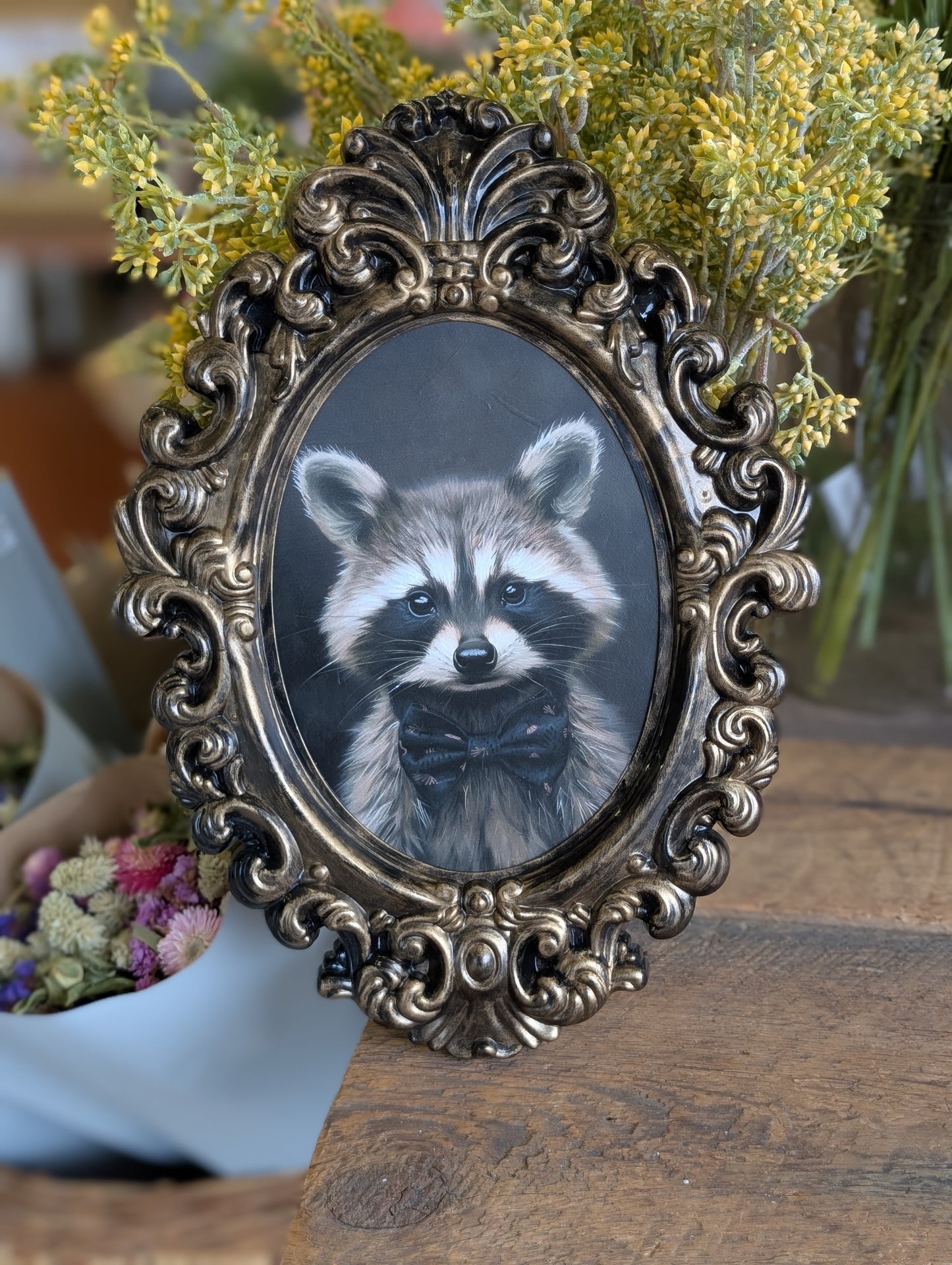 Oval baby raccoon print