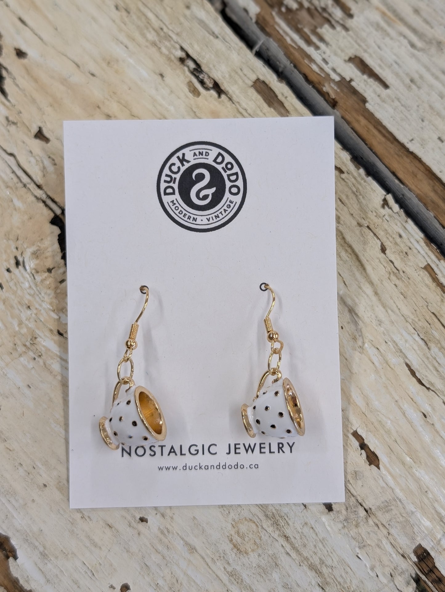 Black dot teacup earrings