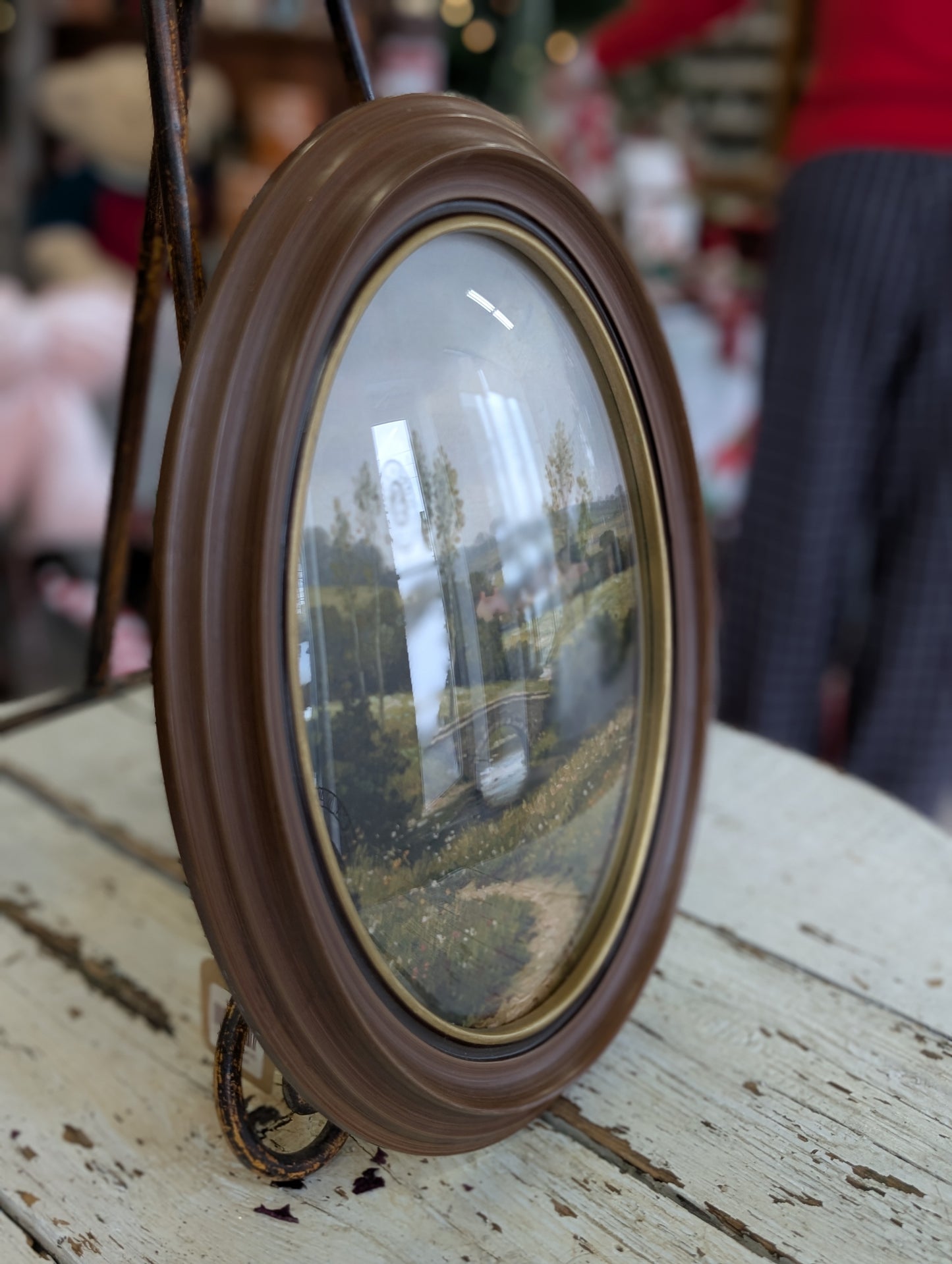 Oval frame scenery art