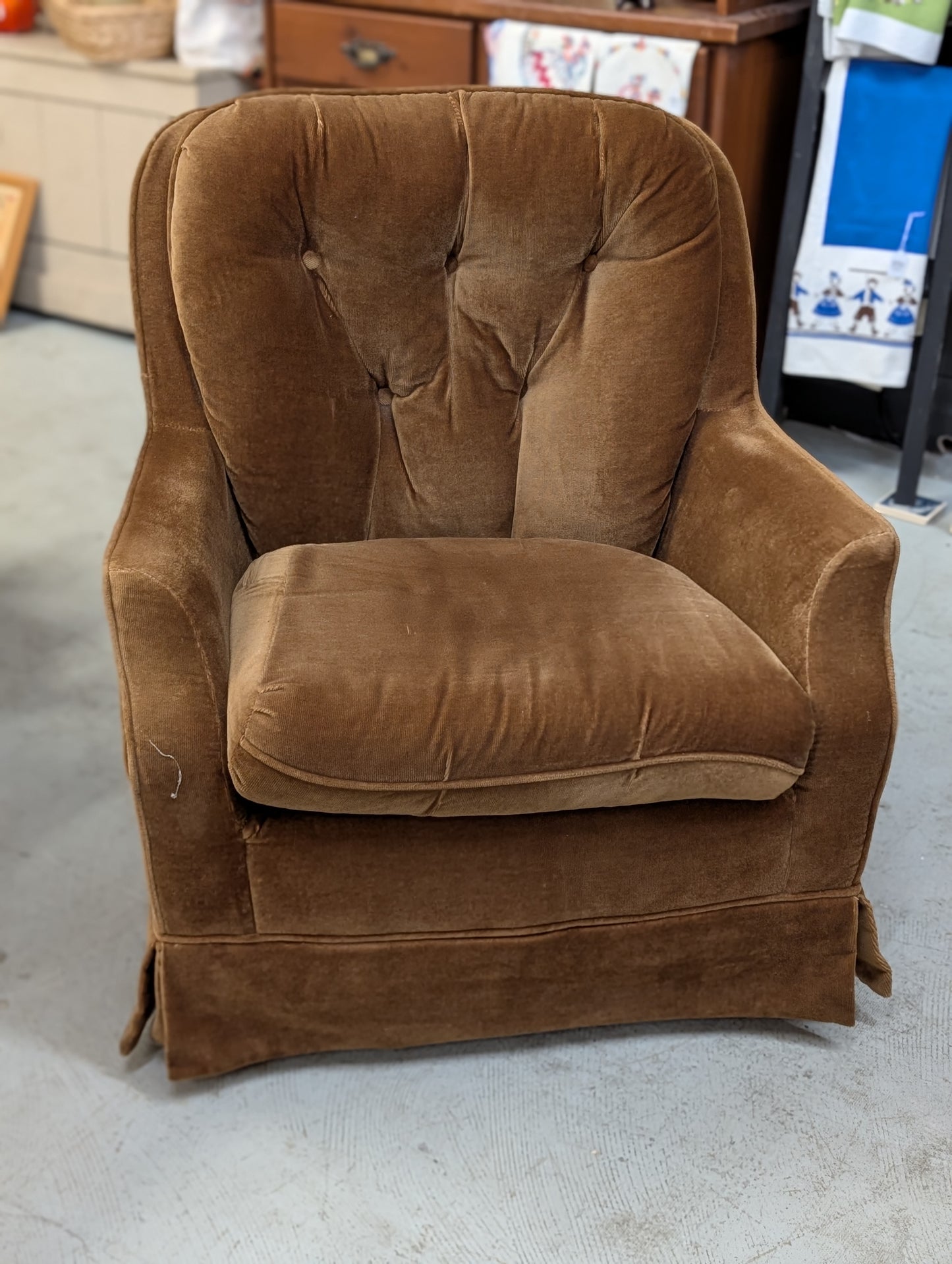 Brown cord swivel chair