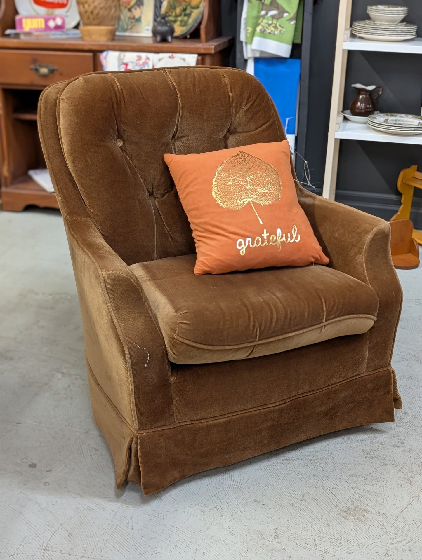 Brown cord swivel chair