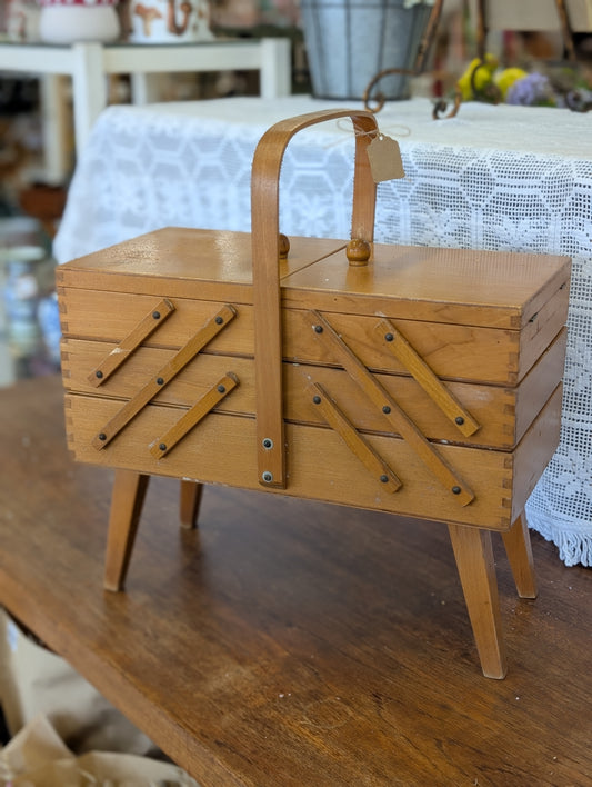 Wooden sewing box with contents