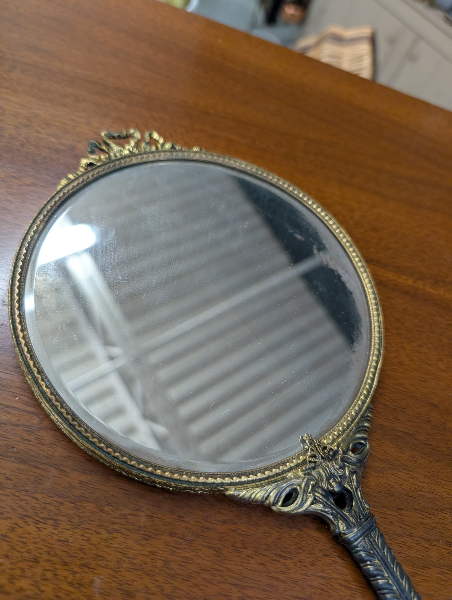 Hand held mirror