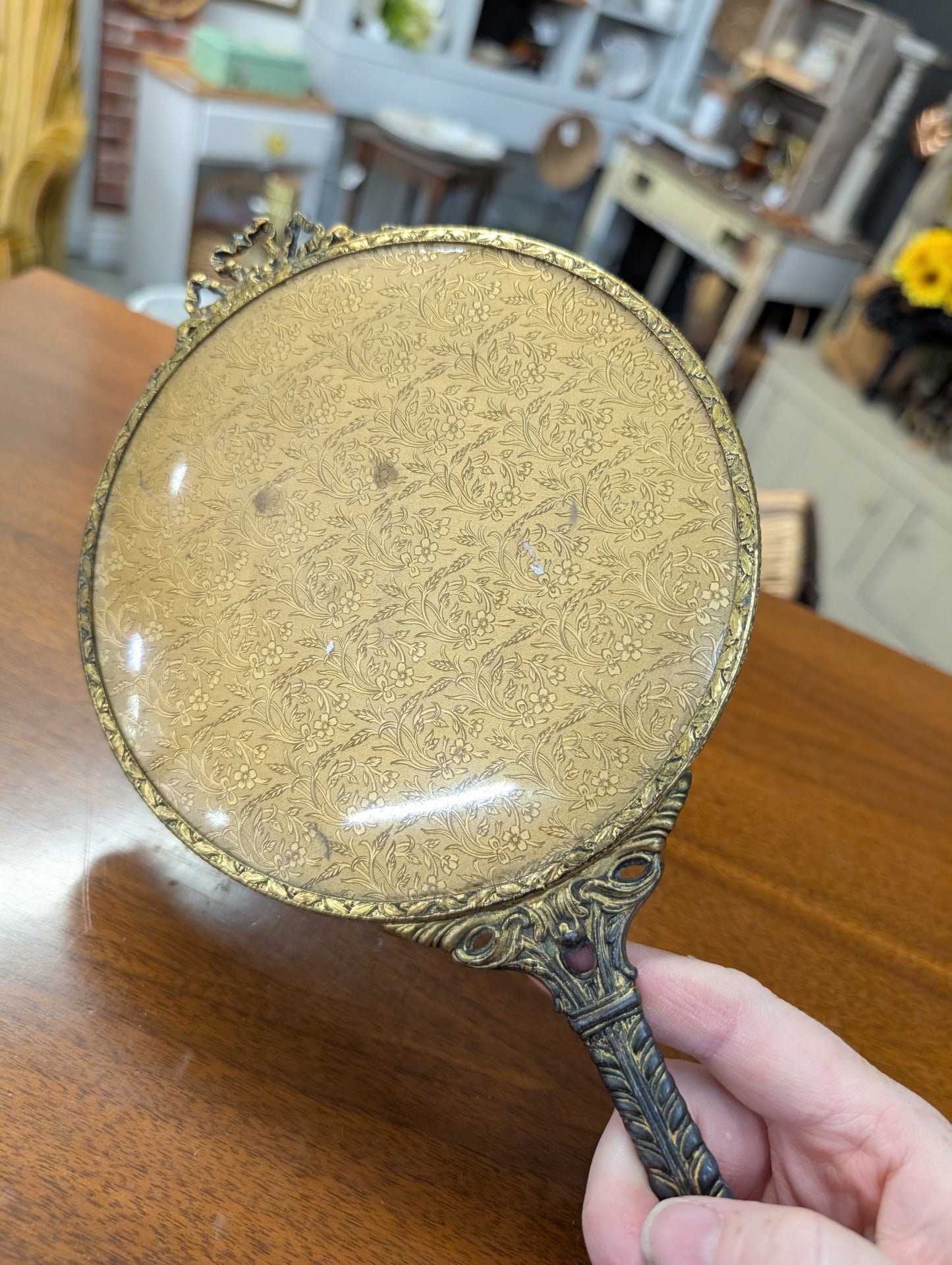 Hand held mirror