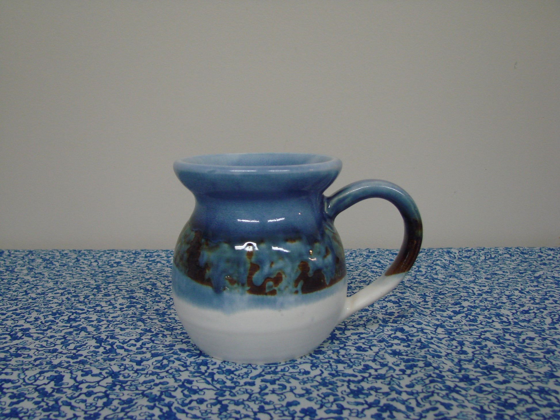 Blue textured signed pottery mug - 1