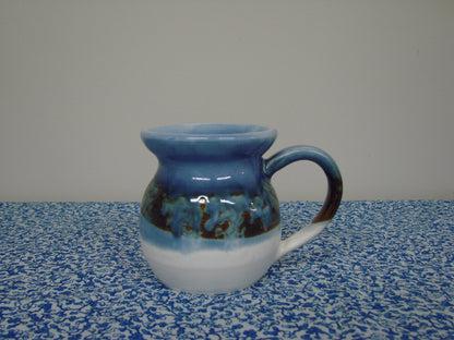 Blue textured signed pottery mug - 1