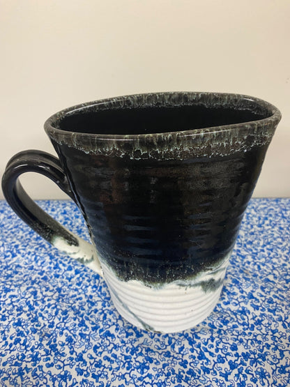 Pottery black and white pitcher - 2