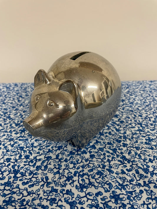 silver plated piggy bank with plug
