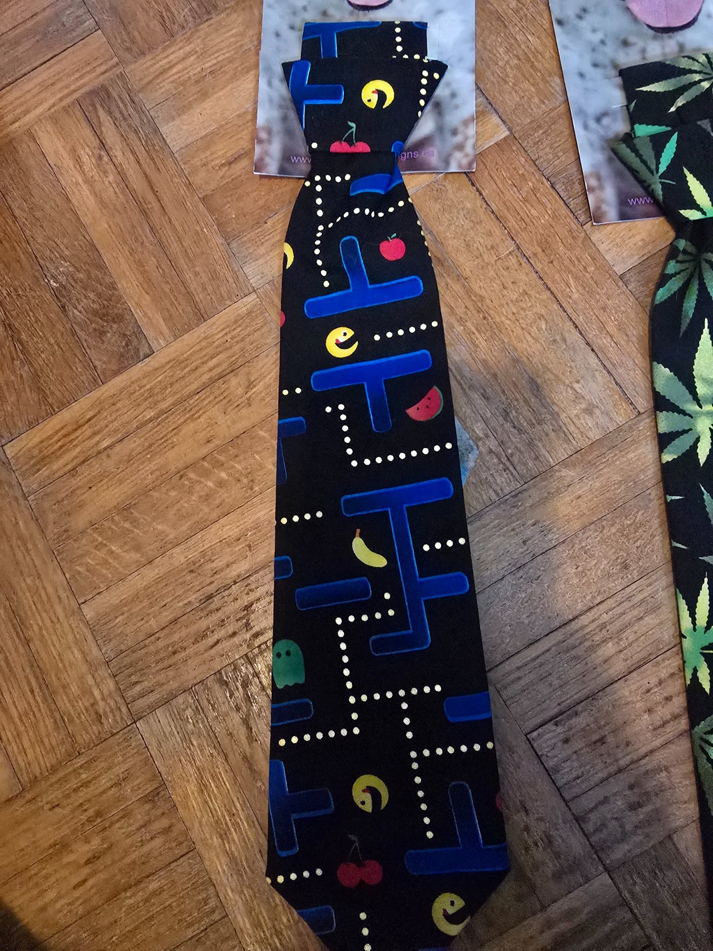 665f5e7d04f32b049949ecdf_lg-tie-pacman_1762278324399.jpg