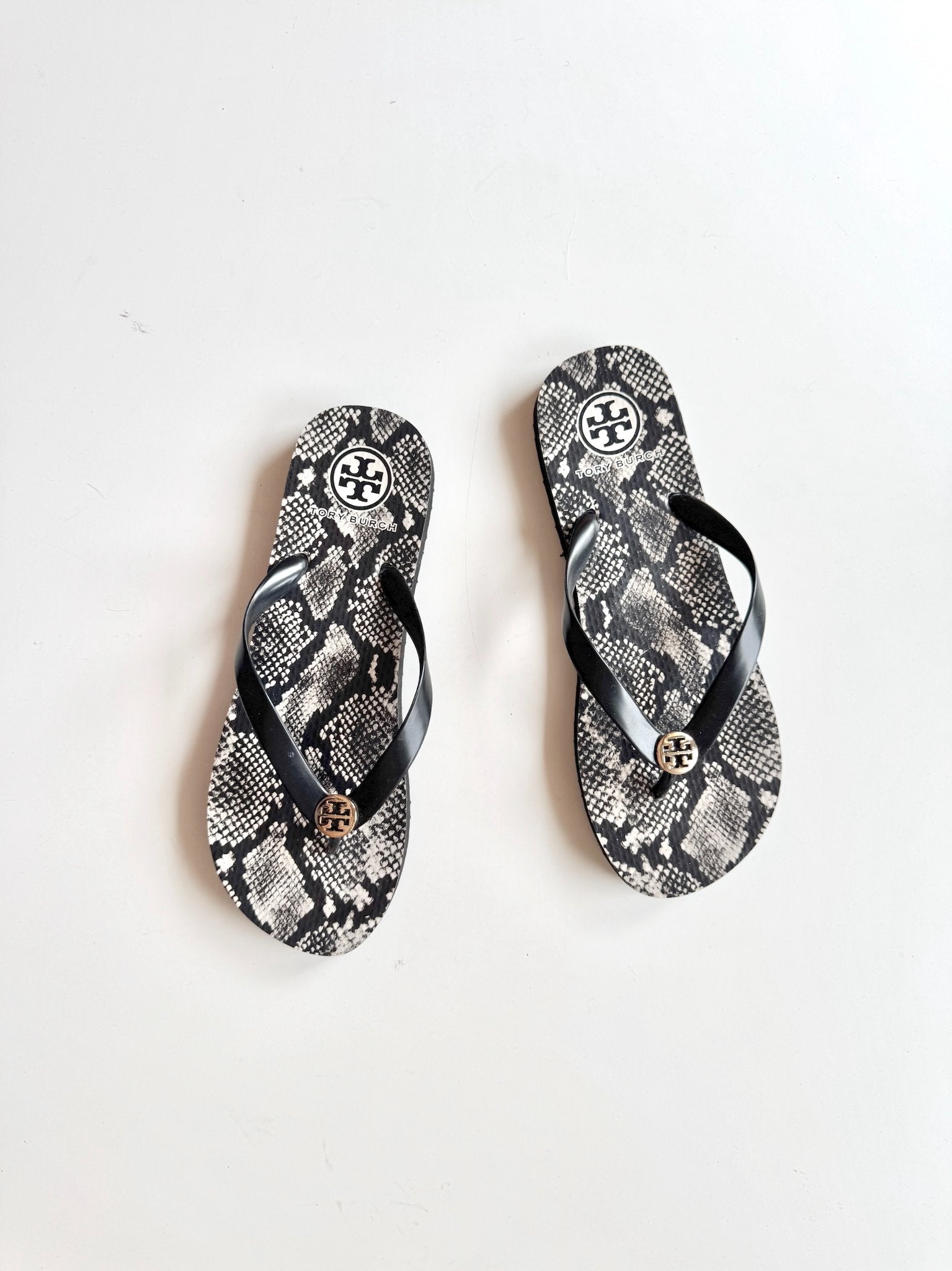 665f5e7d04f32b049949ecdf_tory-burch-thong-1-copy_1781106360096.jpg