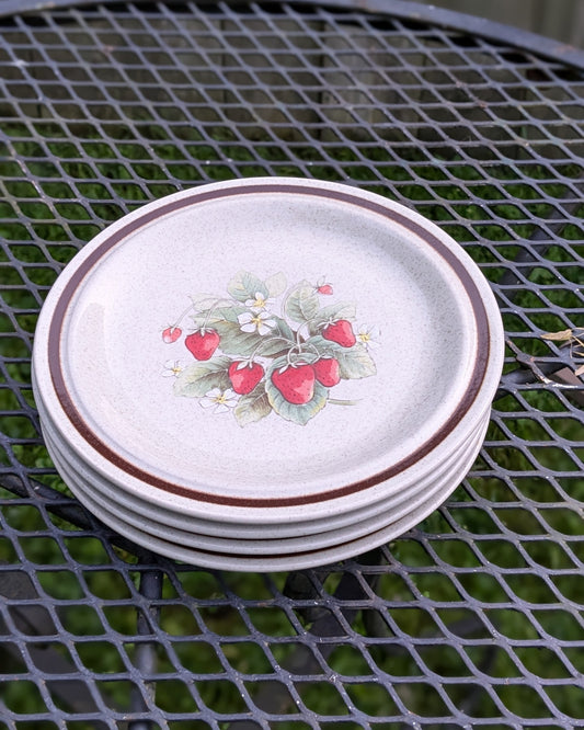 Set of 4 bread plates