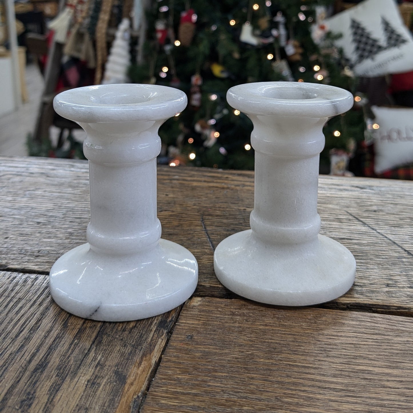 White marble candle stick holders