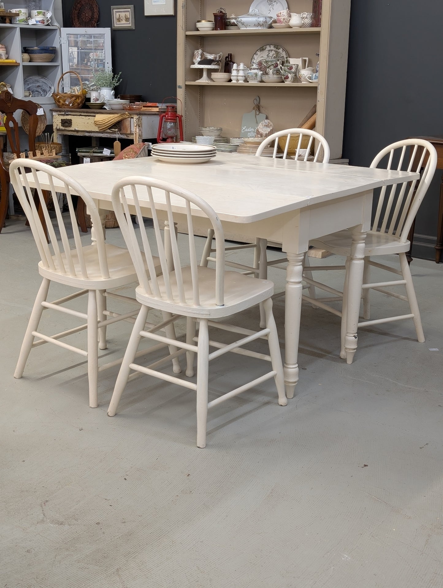 Painted white drop leaf table with 4 chairs