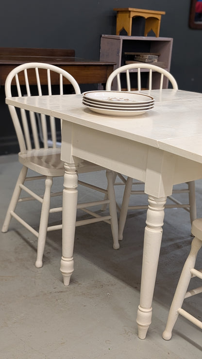 Painted white drop leaf table with 4 chairs