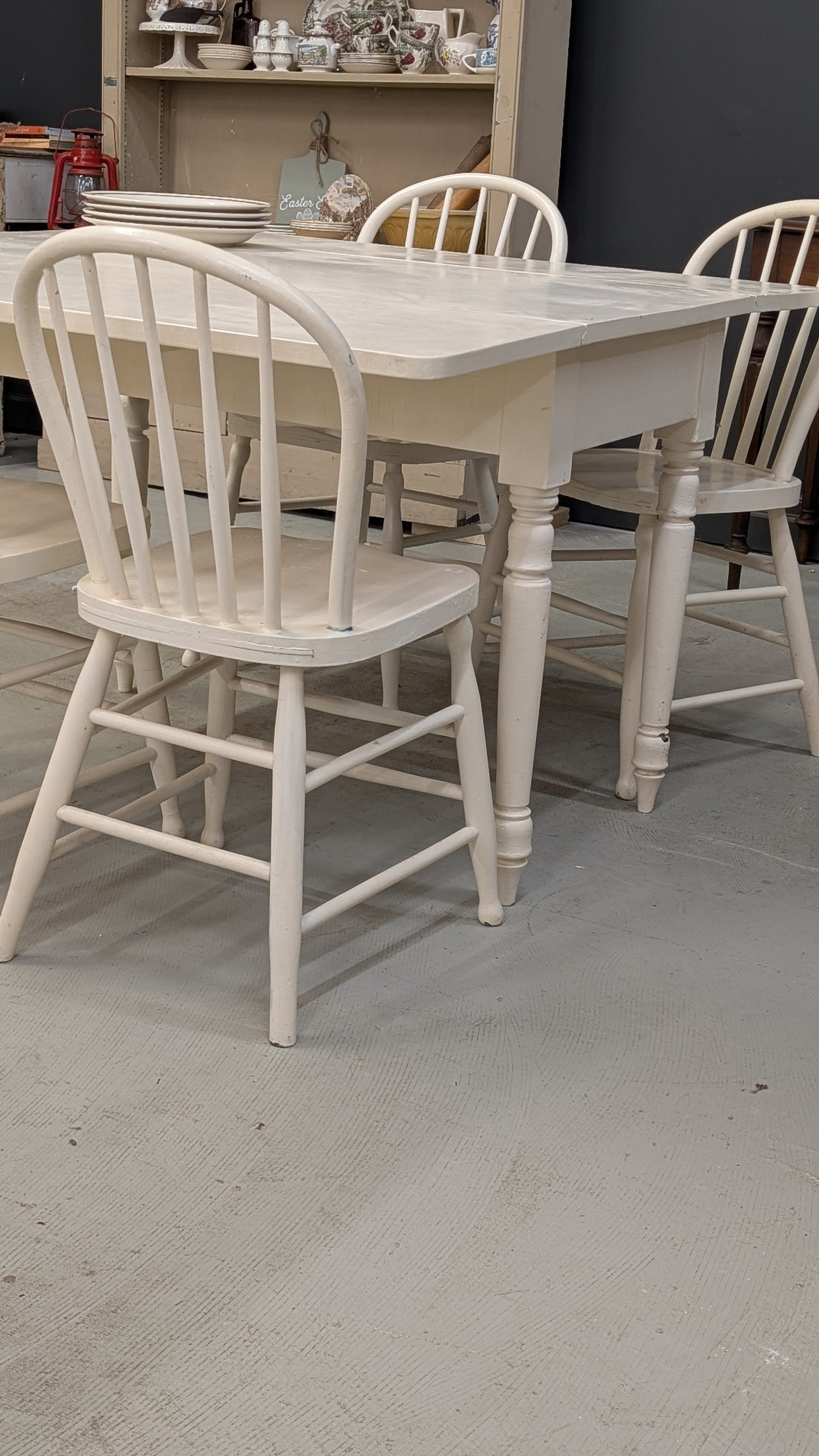 Painted white drop leaf table with 4 chairs