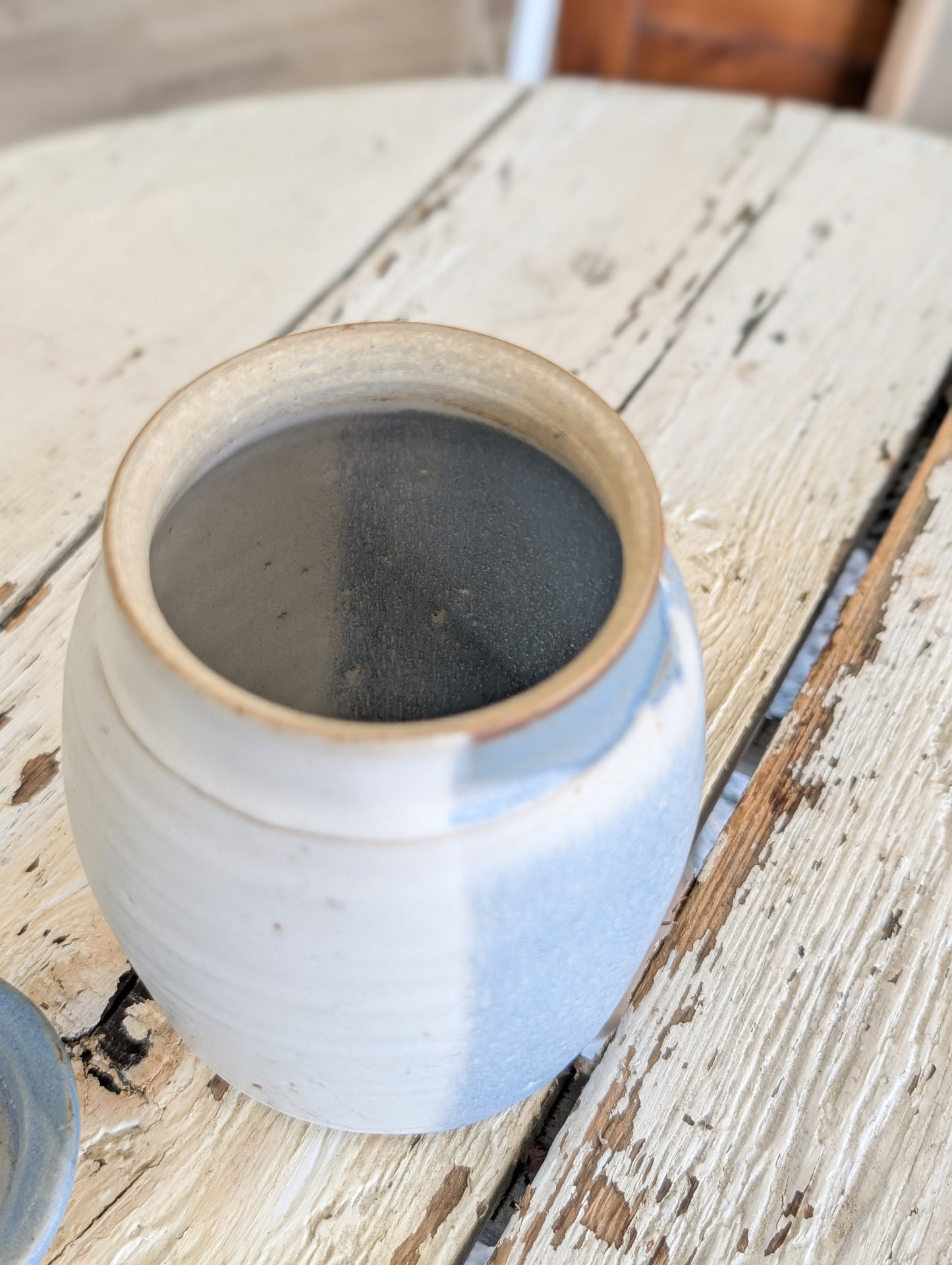 Small blue pottery container