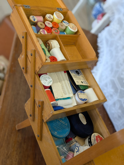 Wooden sewing box with contents