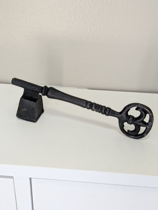 Key candle snuffer