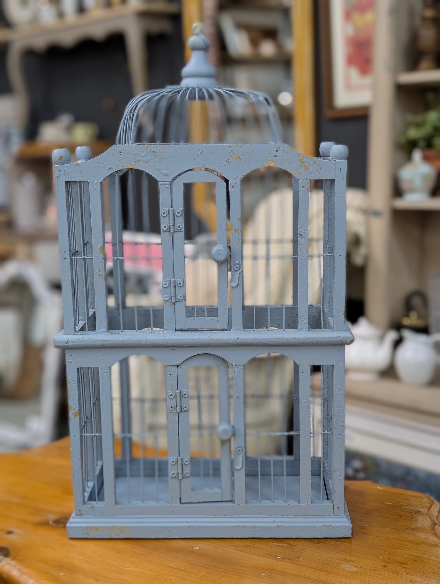 Large blue wooden faux birdcage