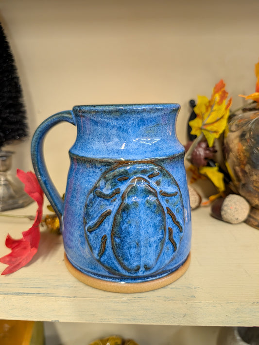 Blue pottery mug