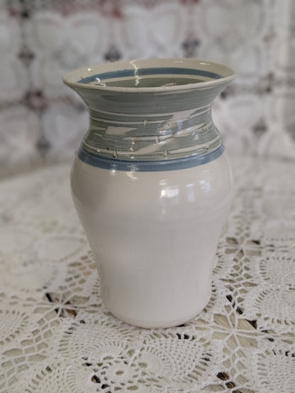 Handmade studio pottery vase with white glaze and blue/gray bands