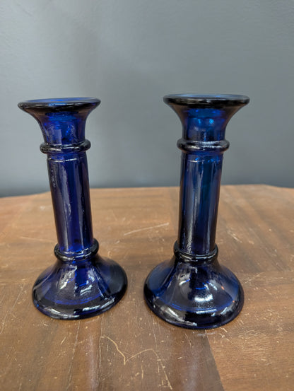 Set of blue glass candle sticks