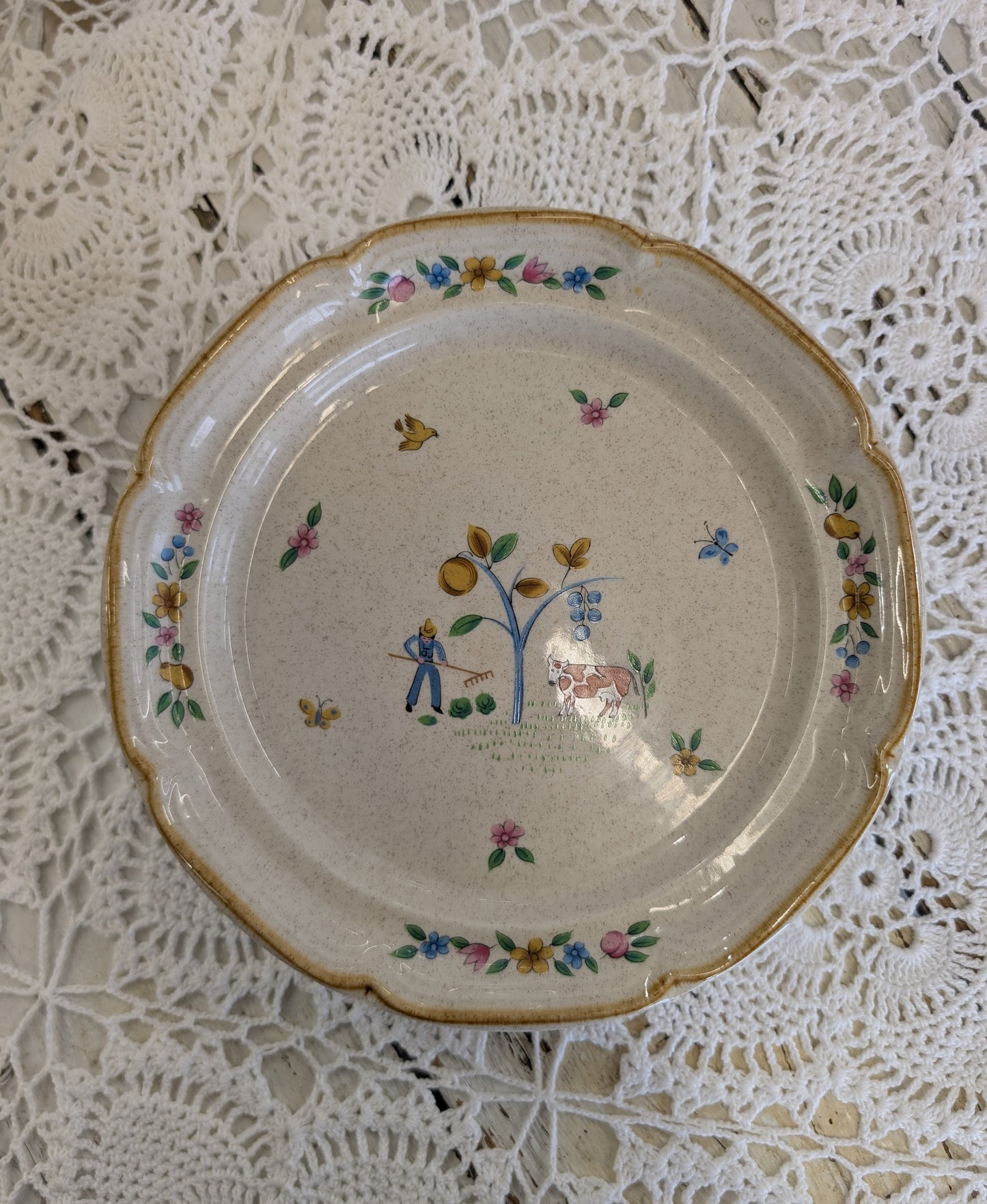 International Stoneware Heartland pattern salad plate with farm scene.