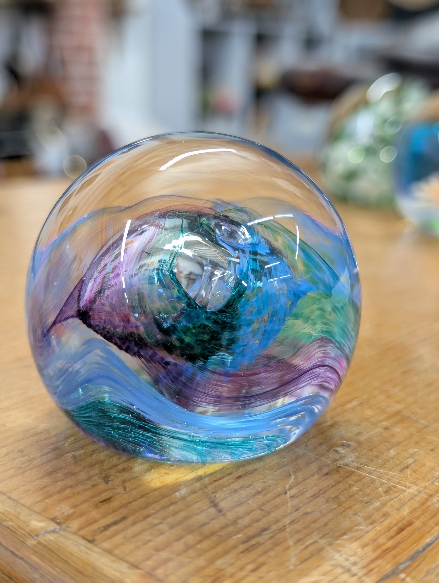 Hand blown glass paper weight