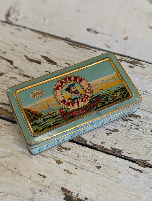 Vintage Player's Navy Cut Cigarettes advertising tin with sailor motif