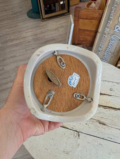 Ceramic bird in cage