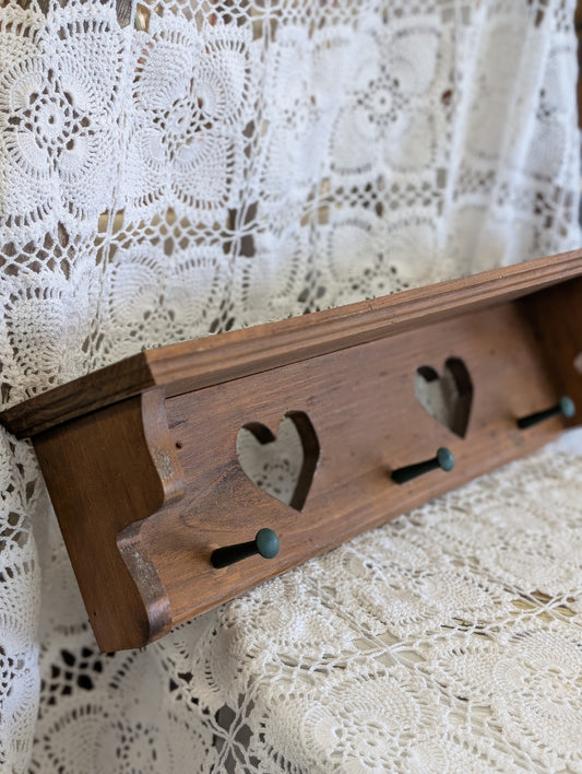Wooden shelf with hearts