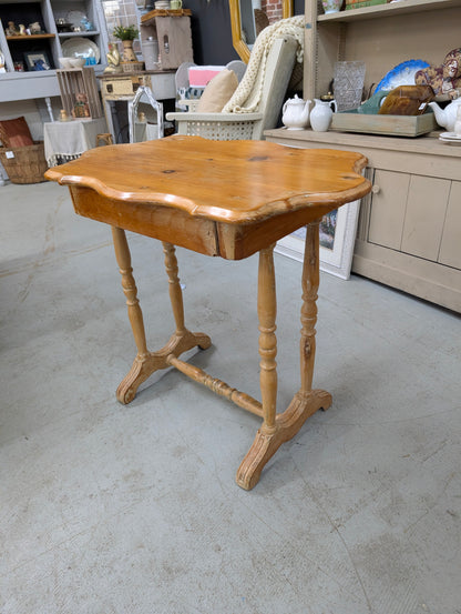 Curved pine side table
