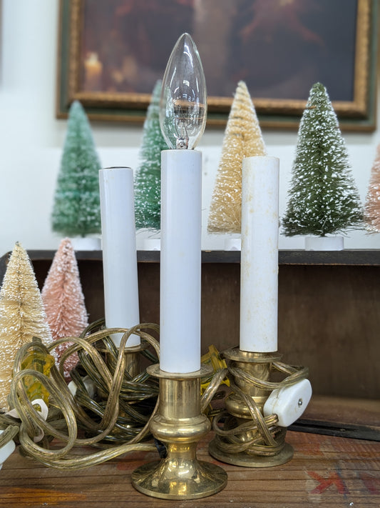 Set of three brass plug in candles