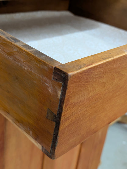 A two-piece Canadian pine cupboard with glass and solid doors