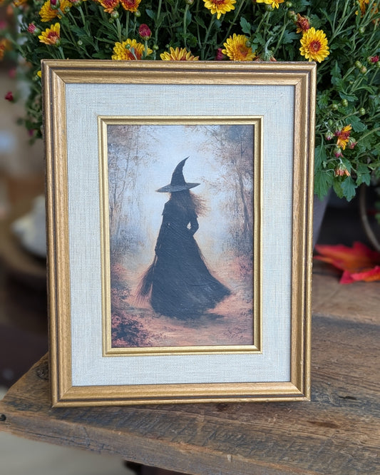 Strolling witch framed print