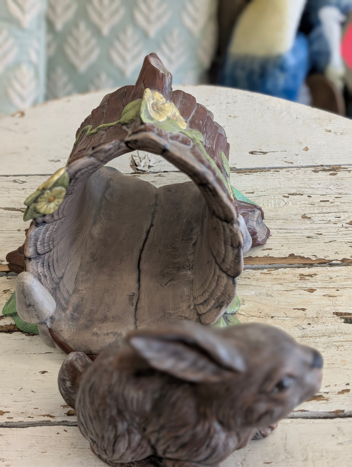 Ceramic bunny and log