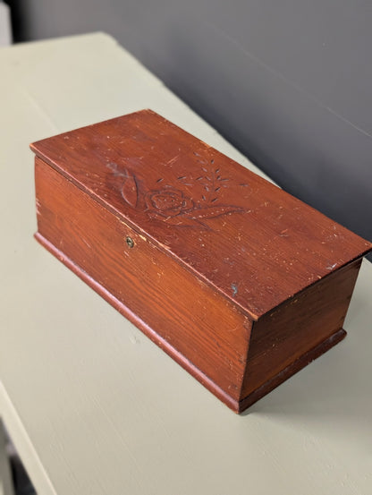 Wooden box with carvings