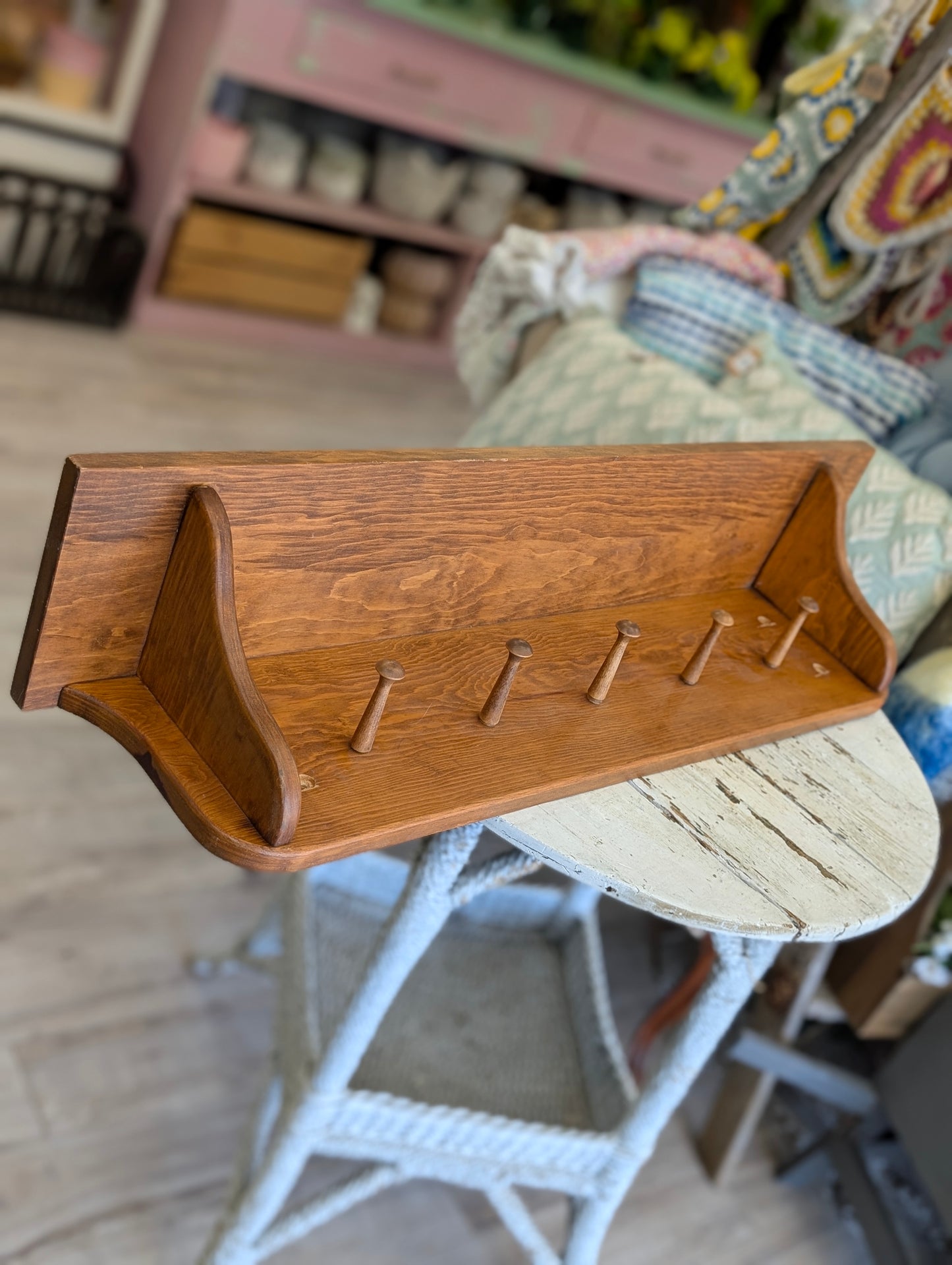Wooden shelf with hooks