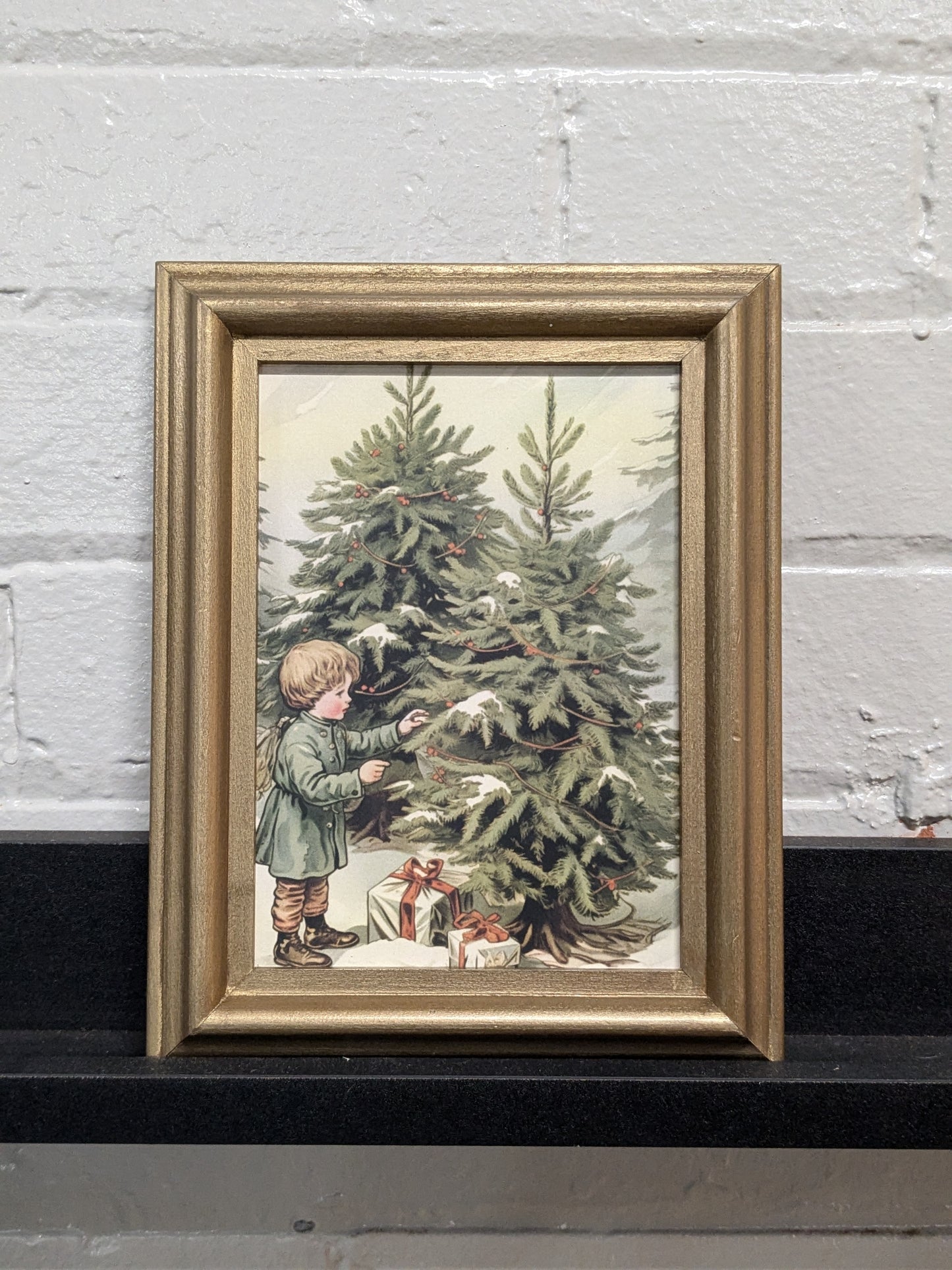 Vintage boy and tree framed print