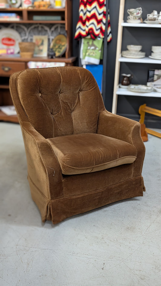 Brown cord swivel chair