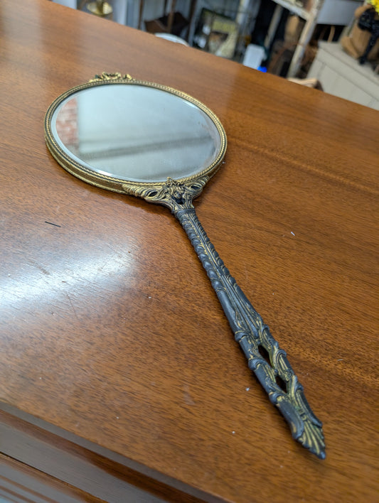 Hand held mirror