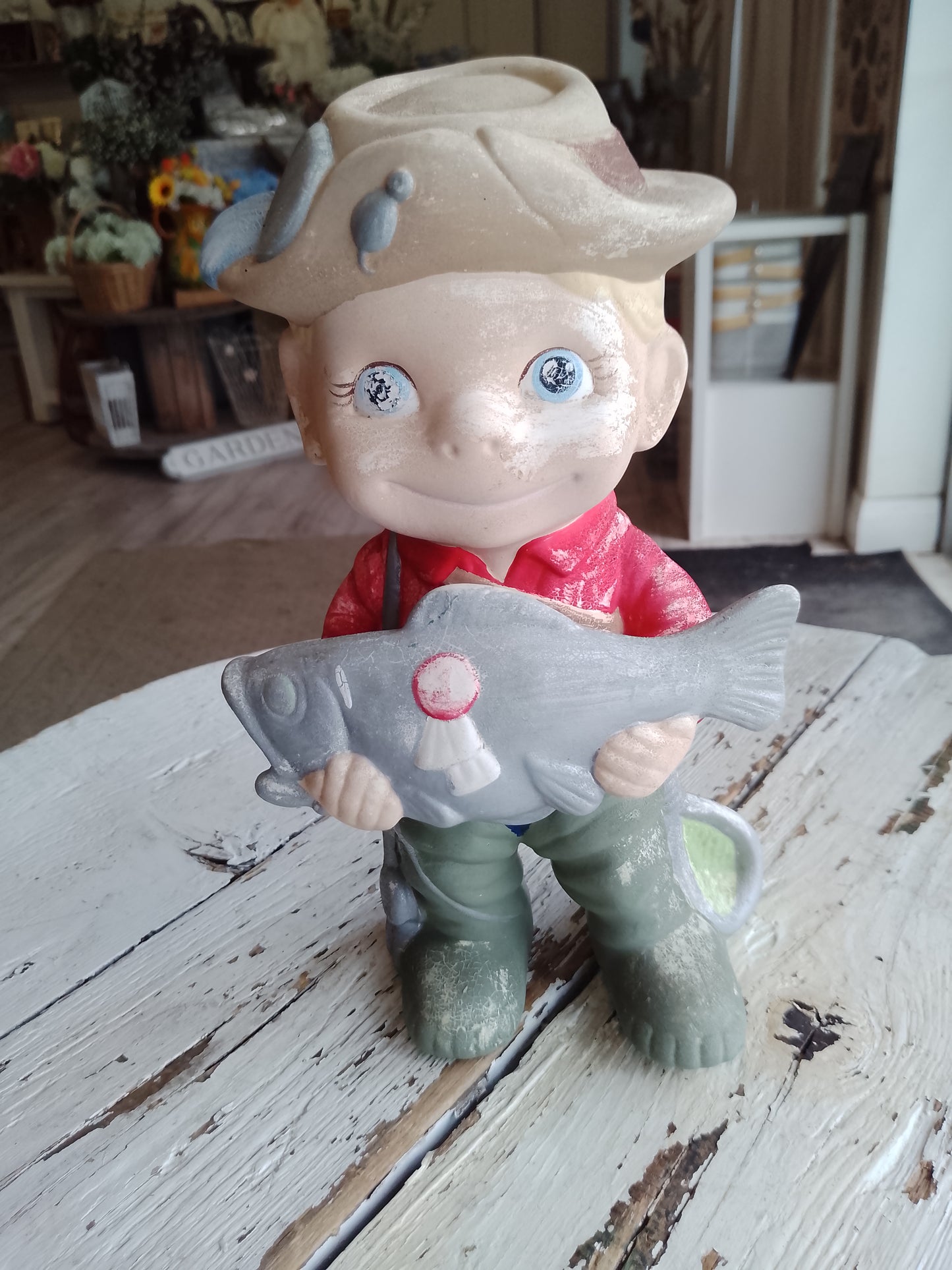 Ceramic Boy holding Fish