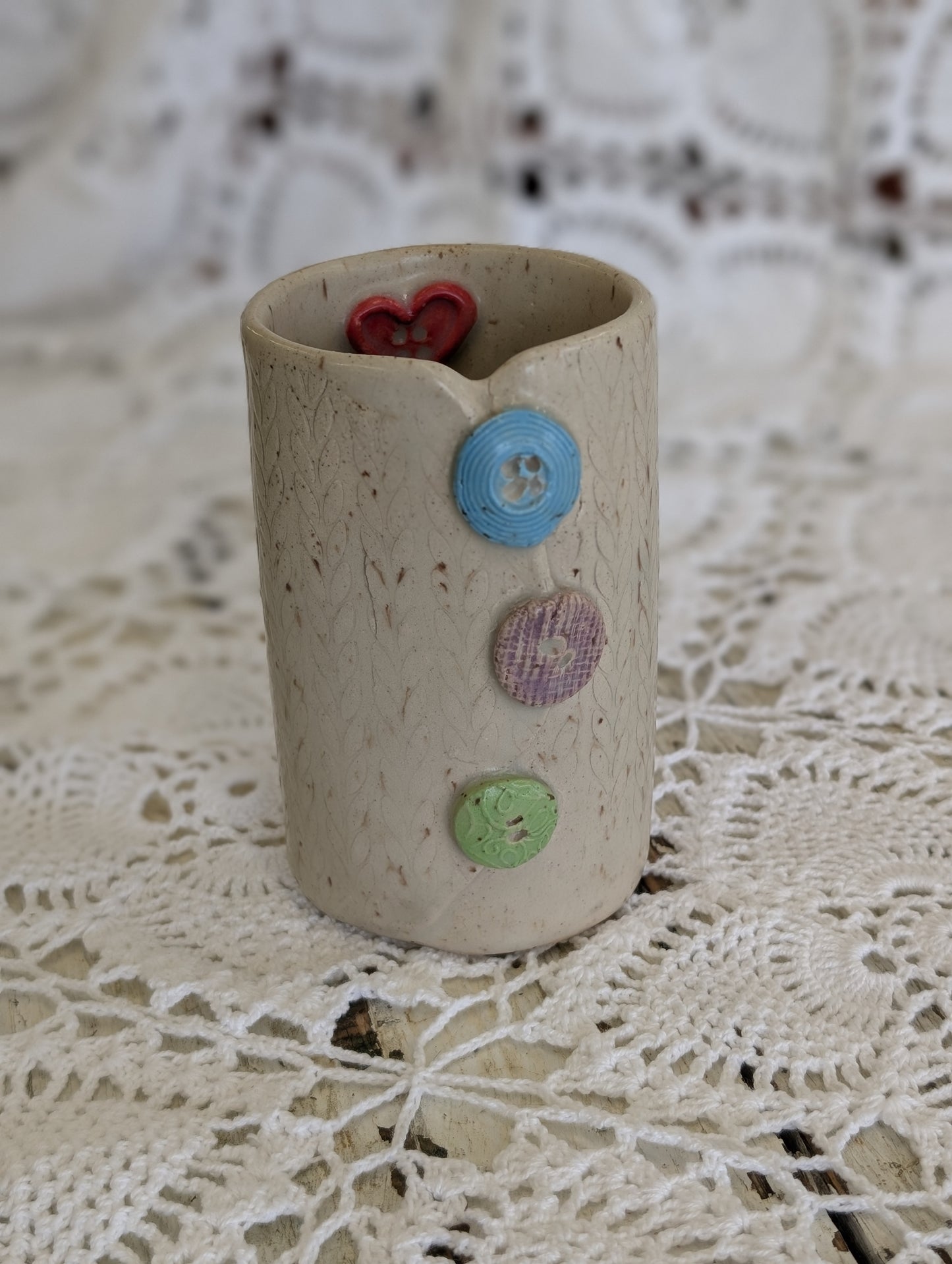 Small button vase