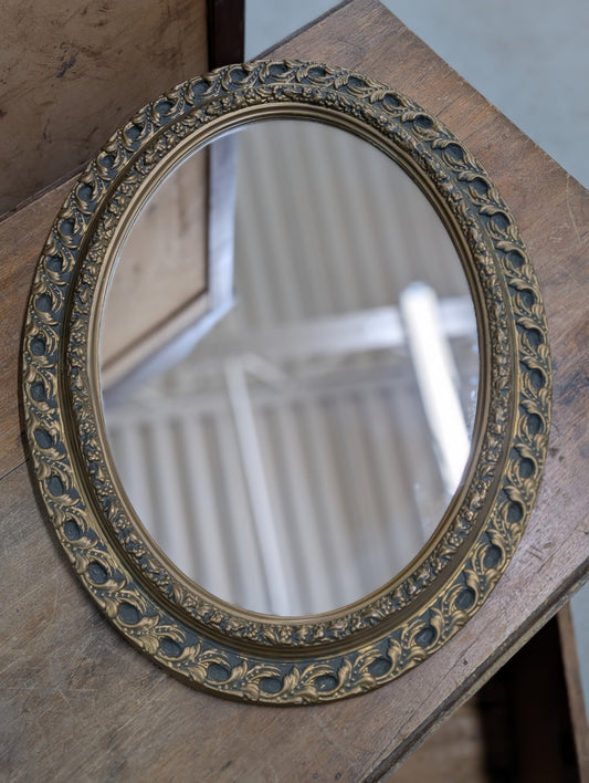 Oval mirror with acrylic frame